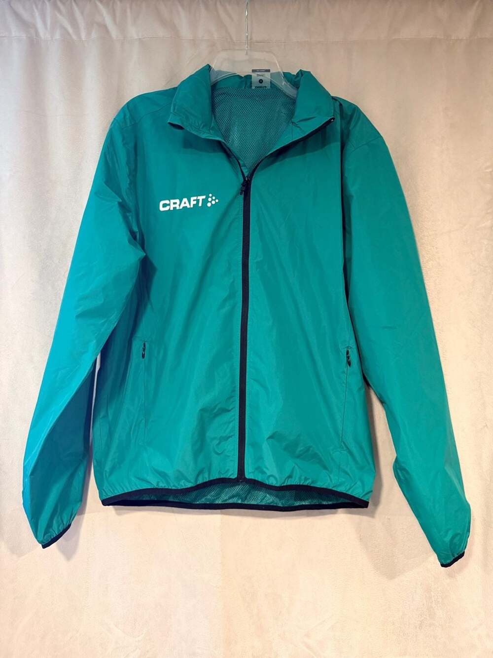 Craft Men's Lightweight Performance Windbreaker Jacket in Teal